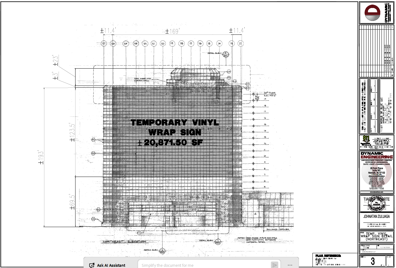 Temporary vinyl wrap sign detail showing the large exterior wrap area